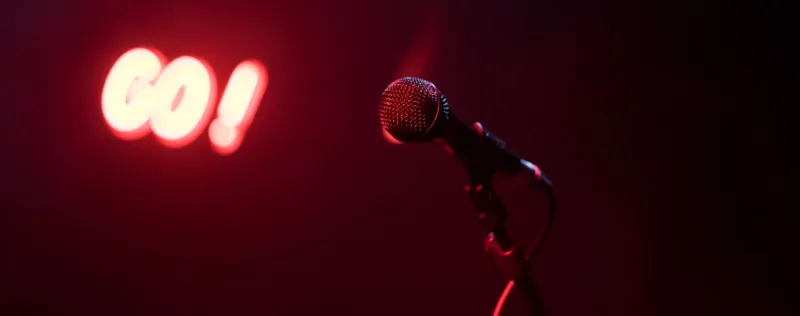 Grab the Mic: How Certain Retro Anthems Became the Undisputed Kings and Queens of Karaoke Night